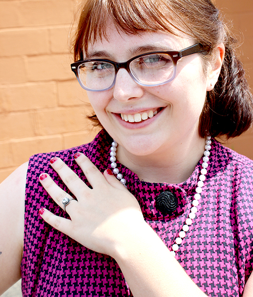 Aubin modeling her Nested White Topaz Engagement Ring